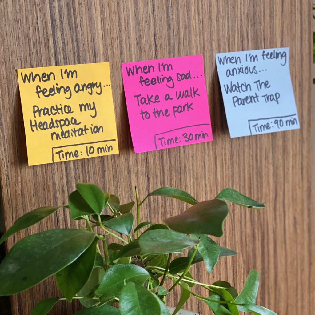 Photo of three post-it notes with self-care activities and their time commitments